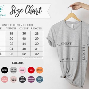 以下が含まれることがあります： ユニセックスジャージTシャツのサイズチャート。幅、胸囲、着丈の寸法はインチ単位。サイズはS、M、L、XL、2XL。チャートには、幅、胸囲、着丈の寸法が示されたグレーのTシャツが表示されています。