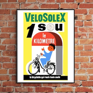 May include: A vintage poster advertising the Velosolex bicycle. The poster features a cartoon illustration of a child riding a Velosolex with the text "1 sou le kilometre" and "la bicyclette qui roule toute seule".