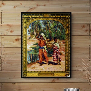 Peut inclure: Une affiche vintage représentant deux jeunes filles marchant dans un paysage désertique. L'affiche est encadrée d'or et porte le texte "LEFEVRE-UTILE" en bas.