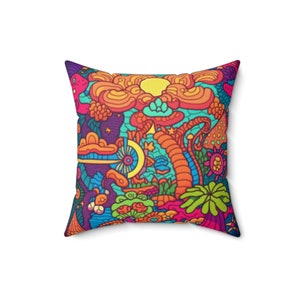May include: A square throw pillow featuring a vibrant, multi-colored psychedelic pattern. The design includes stylized orange clouds, a yellow sun, swirling lines, and various organic shapes in shades of blue, purple, pink, and green.