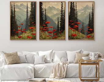 Può includere: Un set di tre quadri murali verticali che raffigurano un paesaggio montano con alti pini scuri e vivaci fiori selvatici rossi in primo piano. L'opera d'arte presenta una tavolozza di colori tenui composta da verdi, grigi e rossi.