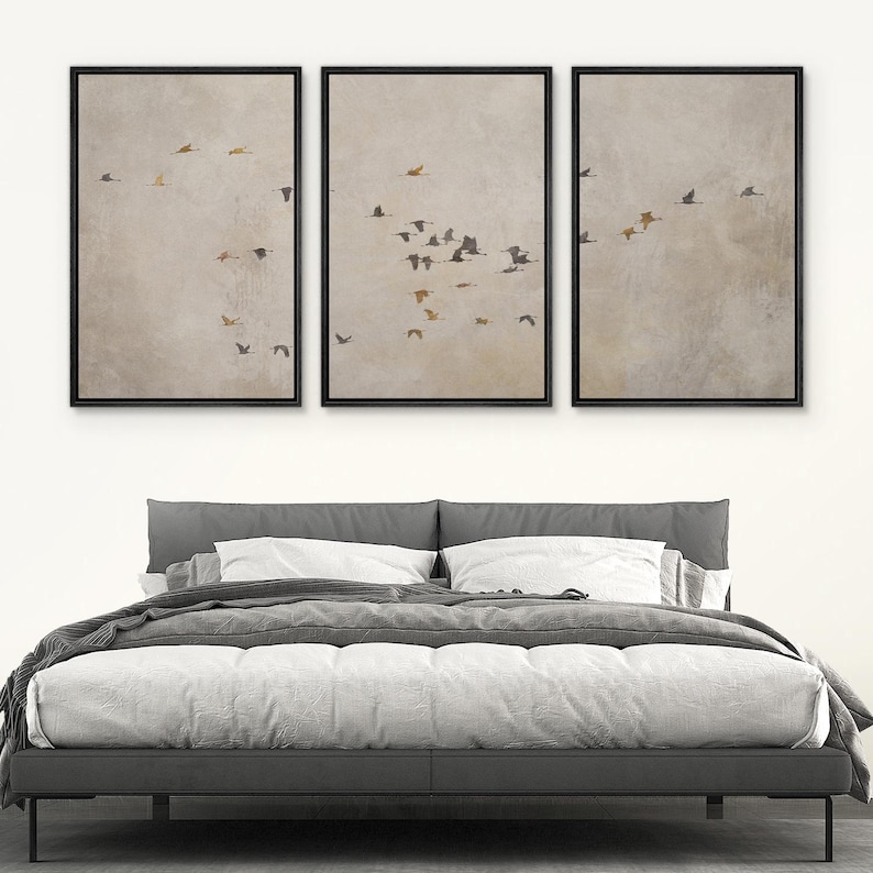 May include: Three framed prints of a flock of birds flying in a V formation against a light gray background.