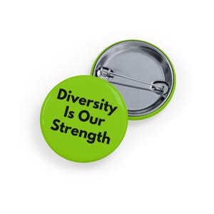 May include: A green button with the text "Diversity Is Our Strength" in black.