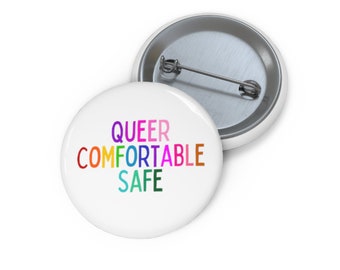 Queer, Confortable, Sûr (pin/bouton)