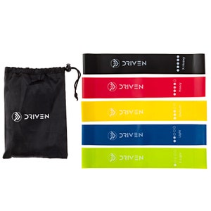 May include: Set of five resistance bands in different colors and resistance levels, including X-Light, Light, Medium, Heavy, and X-Heavy. The bands are labeled with the Driven logo and the resistance level. The set comes with a black drawstring bag.