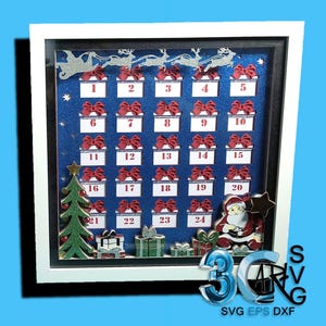 May include: A framed Christmas advent calendar with a blue background and white frame. It features 24 numbered boxes with red bows, a Christmas tree, Santa Claus, and reindeer. The calendar is decorated with glitter and stars.
