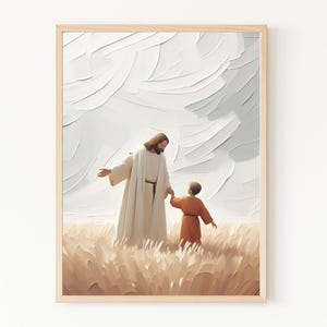 May include: A framed art print depicts a figure in a white robe with a brown belt, holding the hand of a child in an orange robe. They stand in a field of tall, golden grass under a textured white and gray sky. The artwork is in a wooden frame.
