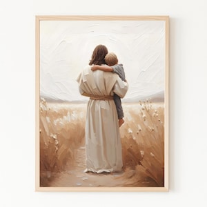 Puede incluir: Una impresión artística enmarcada representa una figura con una túnica blanca sosteniendo a un niño en un campo de hierba alta. La obra de arte tiene una paleta de colores cálidos con tonos beige, marrón y blanco. Las figuras se ven desde atrás.