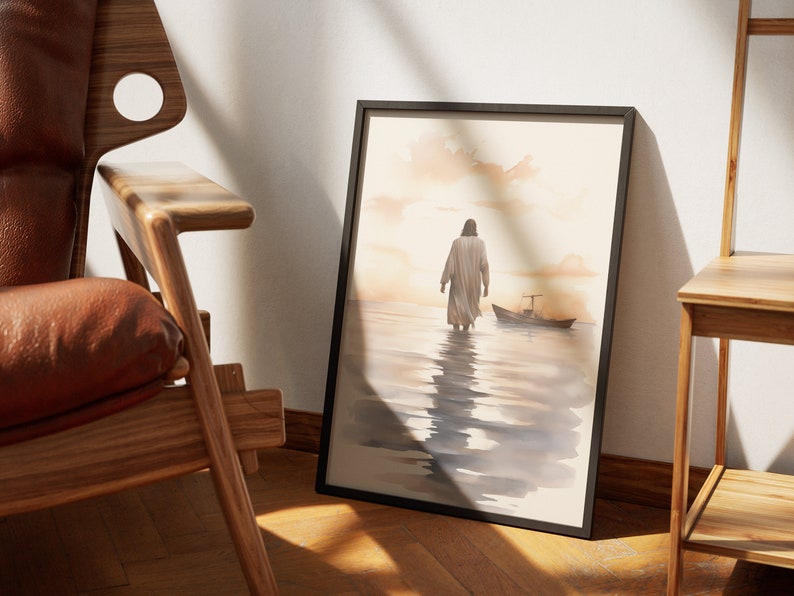 May include: A framed watercolor painting depicting a man walking on water towards a small boat. The painting has a soft, muted color palette with shades of blue, brown, and white. The background features a hazy sunset sky.