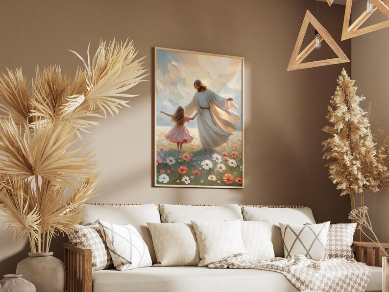May include: A painting of a man in a white robe holding a young girl's hand as they walk through a field of flowers. The painting is framed in a wooden frame and hangs on a wall.