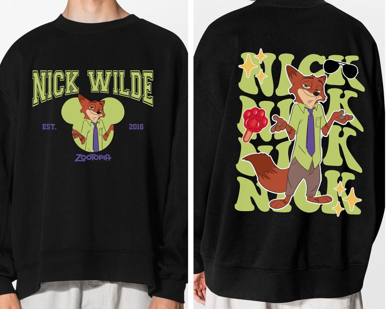 May include: Black sweatshirt featuring a cartoon fox character, Nick Wilde, from Zootopia. The front design includes the text "NICK WILDE" and "EST. 2016 ZOOTOPIA". The back design shows the fox with sunglasses and the name "NICK" repeated.