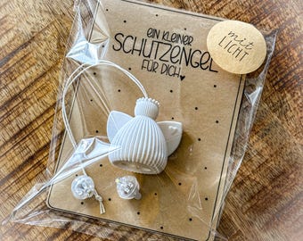 Small guardian angel for hanging with light | Angel