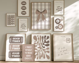 May include: A collection of framed wall art with various designs and quotes. The art pieces include a gingham pattern with a bow, lips, abstract shapes, and ticket stubs with the words "Good Times". The color palette is neutral with brown and beige tones.