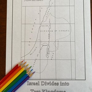 May include: A black and white map of the Kingdoms of Judah and Israel, with the text "Israel Divides into Two Kingdoms c. 931 BC". The map is divided into a grid with lines and labels for different regions, including Galilee, Phoenicia, and the Dead Sea.