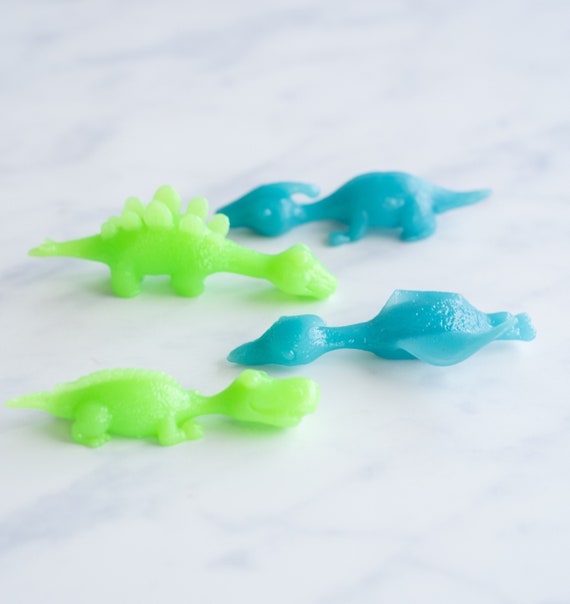 DINO SLINGSHOT Glow in the Dark Add on Squish Toy Anxiety Release