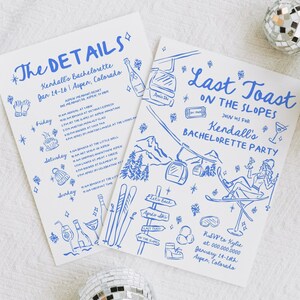May include: A blue and white illustrated invitation for a hen party in Aspen, Colorado. The invitation features a skier on a ski lift with the text "Last Toast on the Slopes" and "Kendall's Bachelorette Party".