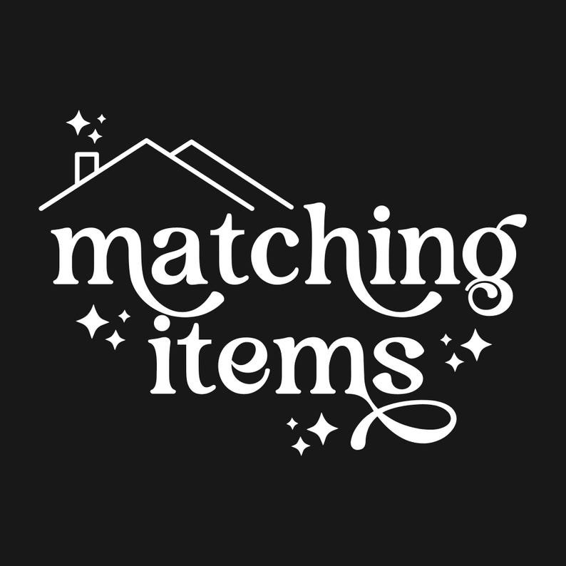 May include: White logo with a stylized house and the text "matching items" with stars around the text.