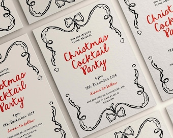 May include: White Christmas cocktail party invitations with red and black text. The invitations have a decorative black border with bows and swirls. The text reads "Christmas Cocktail Party" and includes the date and time.