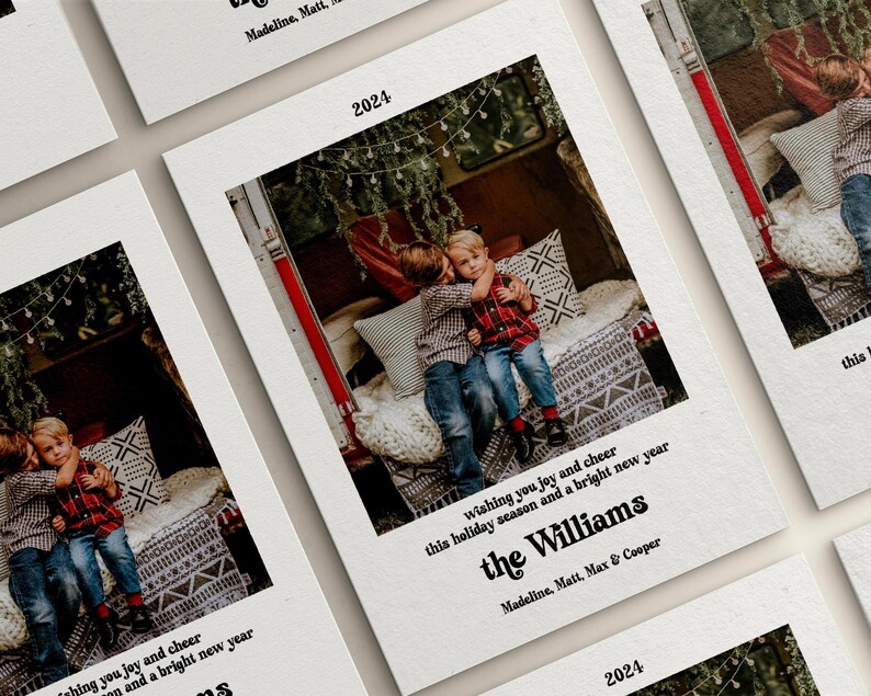 May include: A stack of holiday cards with a family photo inside a vintage truck bed. The cards have the year 2024 printed on them, along with the family name "The Williams" and a holiday greeting. The cards are on a white background.