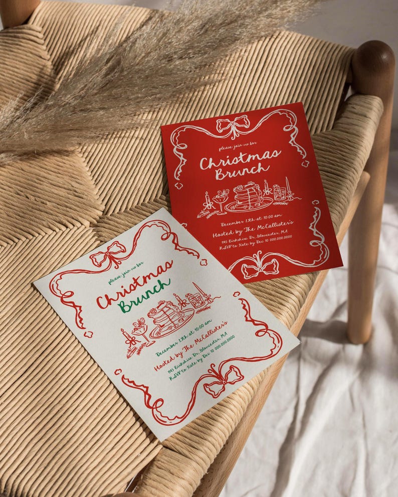 May include: Two Christmas Brunch invitations. One is red with white text and illustrations, the other is white with red text and illustrations. Both feature bow and ribbon designs. The invitations are on a woven chair.