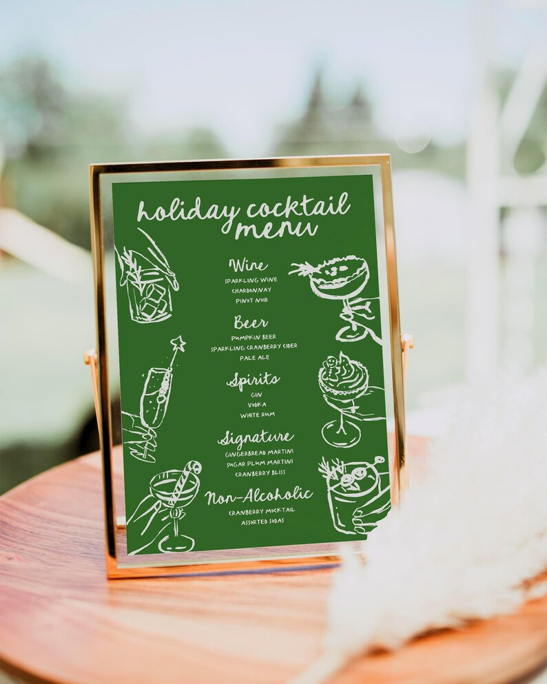 May include: A green chalkboard sign with a gold frame lists a holiday cocktail menu. The menu includes wine, beer, spirits, signature cocktails, and non-alcoholic options. Each drink is illustrated with a hand-drawn sketch.