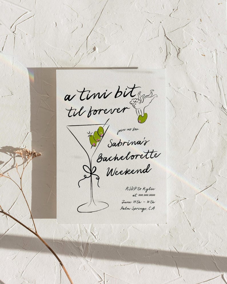 May include: A black and white illustration of a martini glass with olives, with the text "a tini bit til forever" and "Sabrina's Bachelorette Weekend" on a white background. The text also includes RSVP information, date, and location.