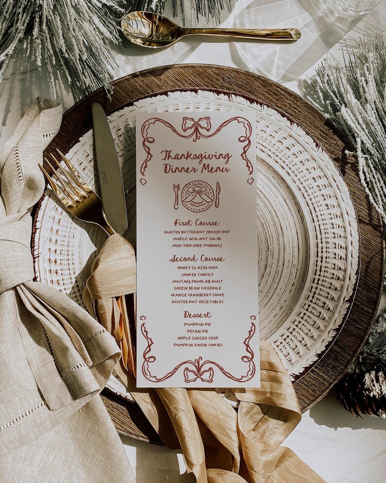 May include: A Thanksgiving dinner menu with a red border and a festive design. The menu lists the courses: First Course, Second Course, and Dessert. Each course includes a list of dishes, such as roasted butternut squash soup, maple walnut salad, honey glazed ham, and pumpkin pie.