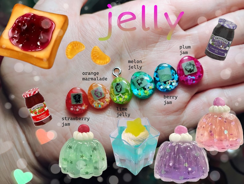 May include: An assortment of colorful jelly-themed charms and miniature food items. Includes a slice of toast with jam, orange marmalade slices, jelly eggs, and miniature jelly desserts. The word "jelly" is written in pink script.