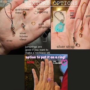 May include: Image displaying fixture options: gold and silver lobster clasps, jump rings, and a mini ball chain. Text highlights the option to put it on a ring, which is adjustable.