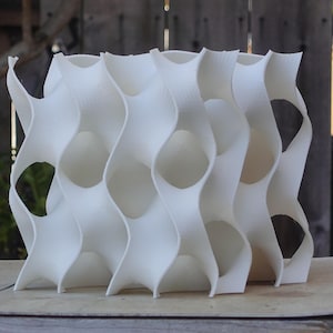 Modern 8x8 gyroid aquarium cave with a sleek, open structure designed to provide hiding and breeding spaces for fish and shrimp. The unique wave-like design adds a stylish, coral-inspired aesthetic to aquariums while enhancing functionality.