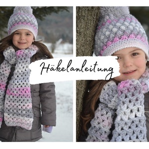 May include: A girl wearing a grey and pink crocheted hat and scarf with a pom pom on top. The hat and scarf have a white and pink striped pattern. The image includes the text "Häkelanleitung".