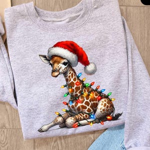 Christmas Giraffe Sweatshirt, Happy Holiday Animal Tee, Festive Lights Reindeer Hat Santa Shirt, Gift for Women, Giraffe Shirt, Xmas Gifts