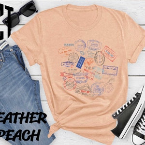 a t - shirt with a bunch of stamps on it