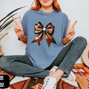 Coquette Football Comfort Colors T-Shirt, Brown Bow Football Mom Tee, Football Fan Gift, Game Day Football T-Shirt, Football Mom Outfit