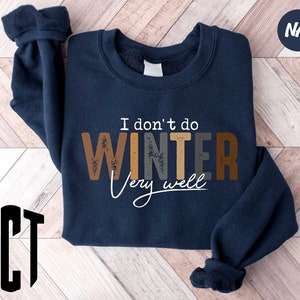 a sweater with the words i don't do winter you suck on it