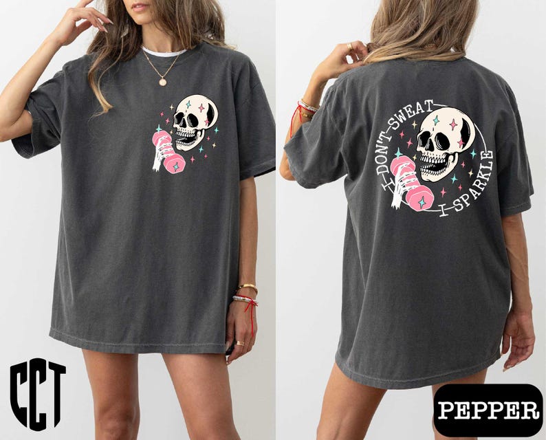 a woman wearing a black shirt with a skull on it