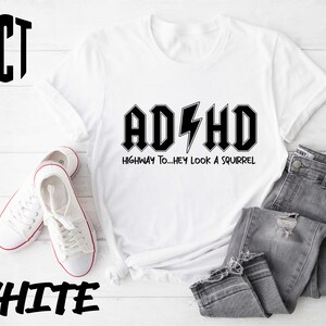 a t - shirt with the words adhd on it