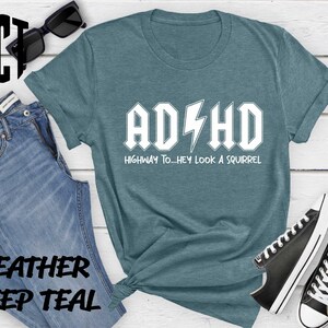 a t - shirt with the words adhd on it