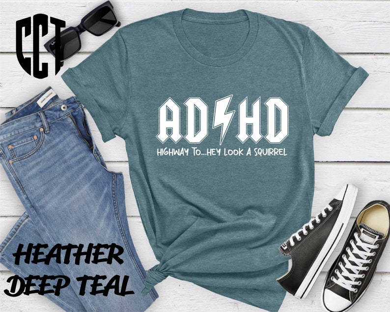 a t - shirt with the words adhd on it
