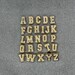 Charms Acciaio PVD Oro Lettere Luca Barra Charms Acciaio PVD Oro Lettere Luca Barra