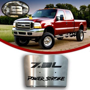 May include: A red Ford F-250 pickup truck with chrome accents and large off-road tires. A stainless steel plate with the text "7.3L POWER STROKE" is in the foreground. An inset image shows the engine.