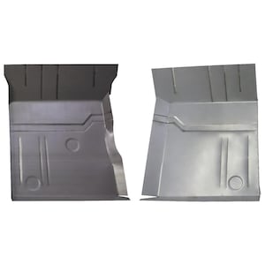 May include: Two silver-colored, stamped metal automotive floor pans. Each pan has a series of rectangular and circular indentations, with a raised edge and a curved side. The pans are designed to fit together.