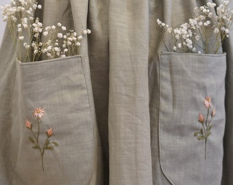 Linen skirt with hand-embroidered pockets