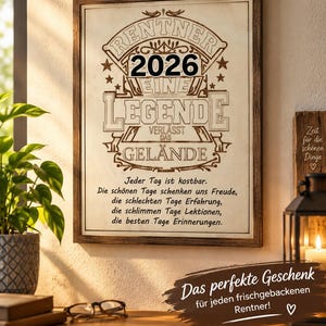 May include: A framed wall sign with a light background and dark brown text that reads RENTNER 2026 EINE LEGENDE VERLÄSST DAS GELÄNDE, followed by a German poem about days. The frame is dark wood, and the design features decorative lines and stars.