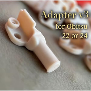 Adapter v3 do korpusów Obitsu 22, 24 lub 26 umożliwiający montaż Blythe na łączniku gryfu.