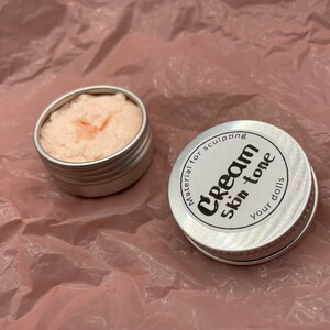 Modeling paste, craft supplies, customizing tools, and a UV lamp for doll face making. Modeling paste is often used to sculpt facial features, while customizing tools can be used to add details like lips or eyeshadow.