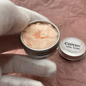 Modeling paste, craft supplies, customizing tools, and a UV lamp for doll face making. Modeling paste is often used to sculpt facial features, while customizing tools can be used to add details like lips or eyeshadow.