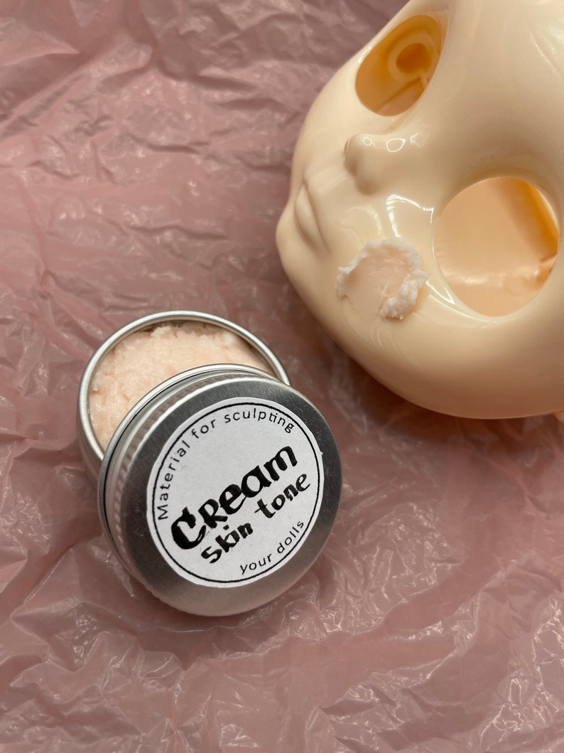 Modeling paste, craft supplies, customizing tools, and a UV lamp for doll face making. Modeling paste is often used to sculpt facial features, while customizing tools can be used to add details like lips or eyeshadow.