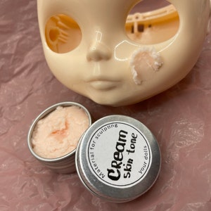 Modeling paste, craft supplies, customizing tools, and a UV lamp for doll face making. Modeling paste is often used to sculpt facial features, while customizing tools can be used to add details like lips or eyeshadow.