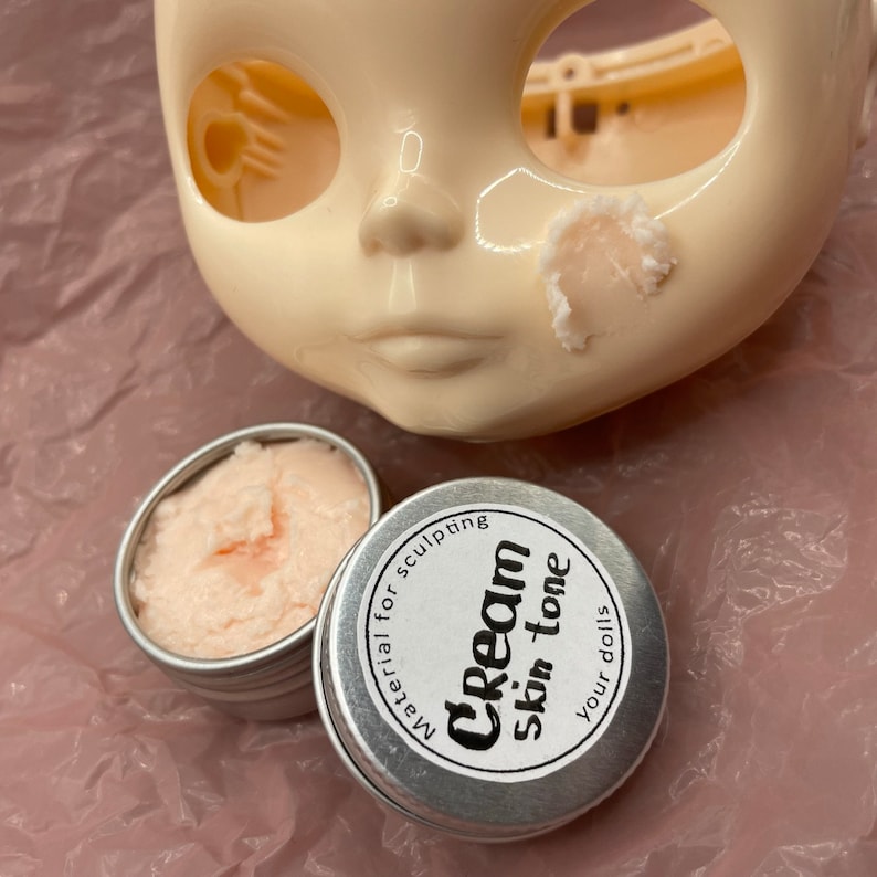 Modeling paste, craft supplies, customizing tools, and a UV lamp for doll face making. Modeling paste is often used to sculpt facial features, while customizing tools can be used to add details like lips or eyeshadow.